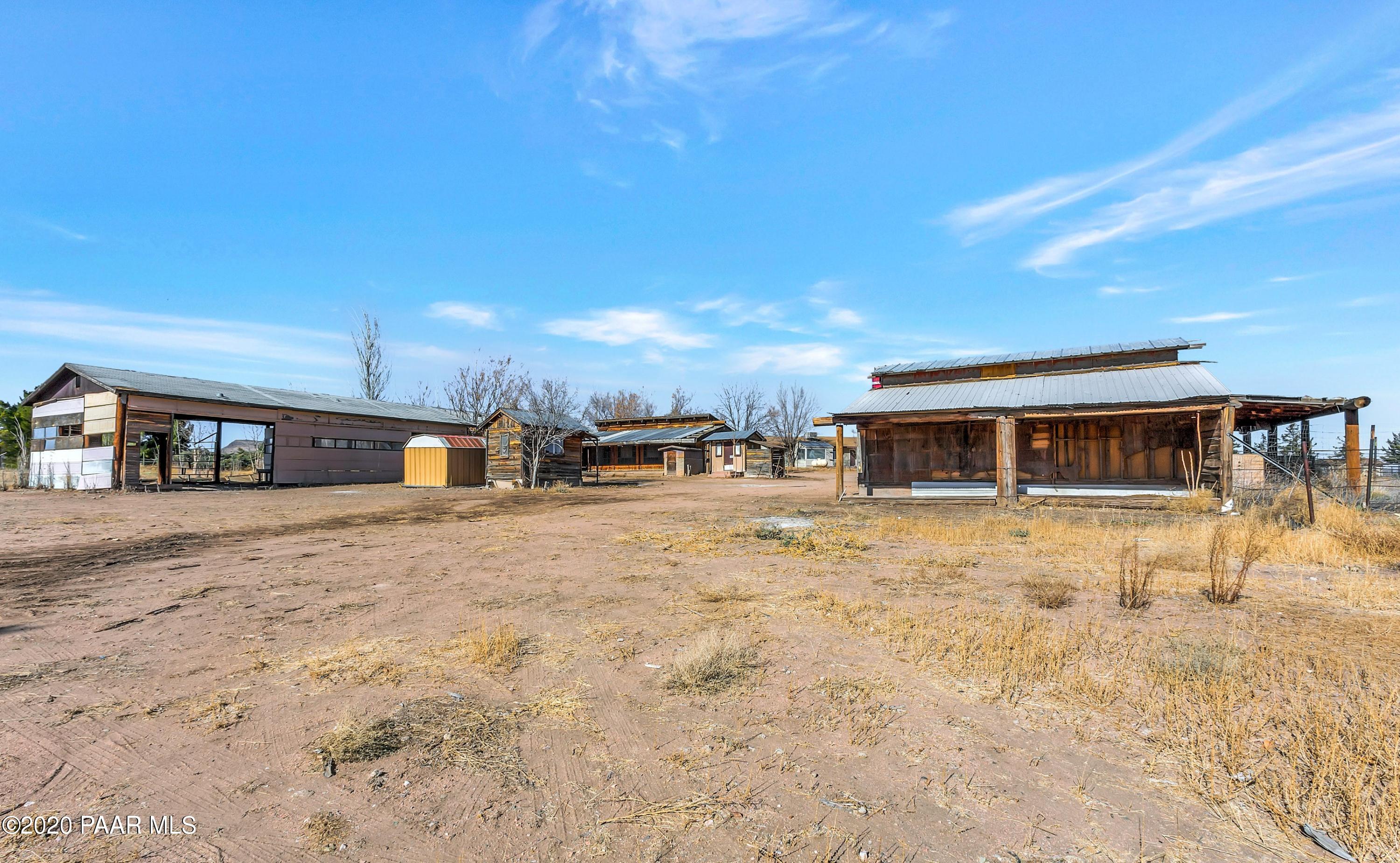 2571 North Reed Road Chino Valley, AZ 86323 - Photo 16 of 25 a view of a house with a yard and sitting area