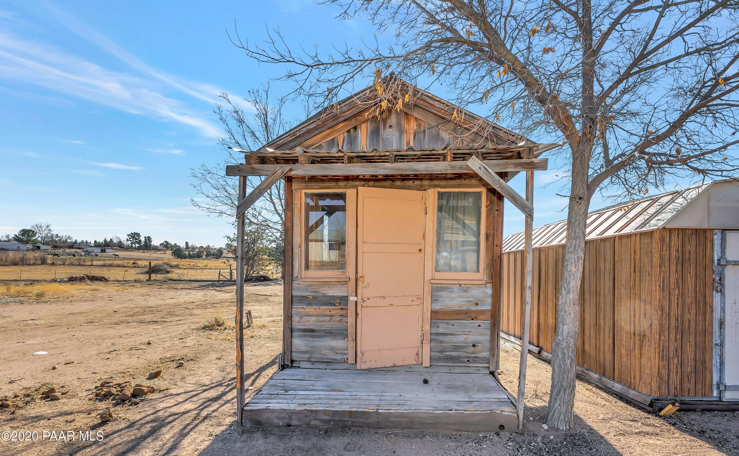 2571 North Reed Road Chino Valley, AZ 86323 - Photo 22 of 25 a front view of a house with ocean view
