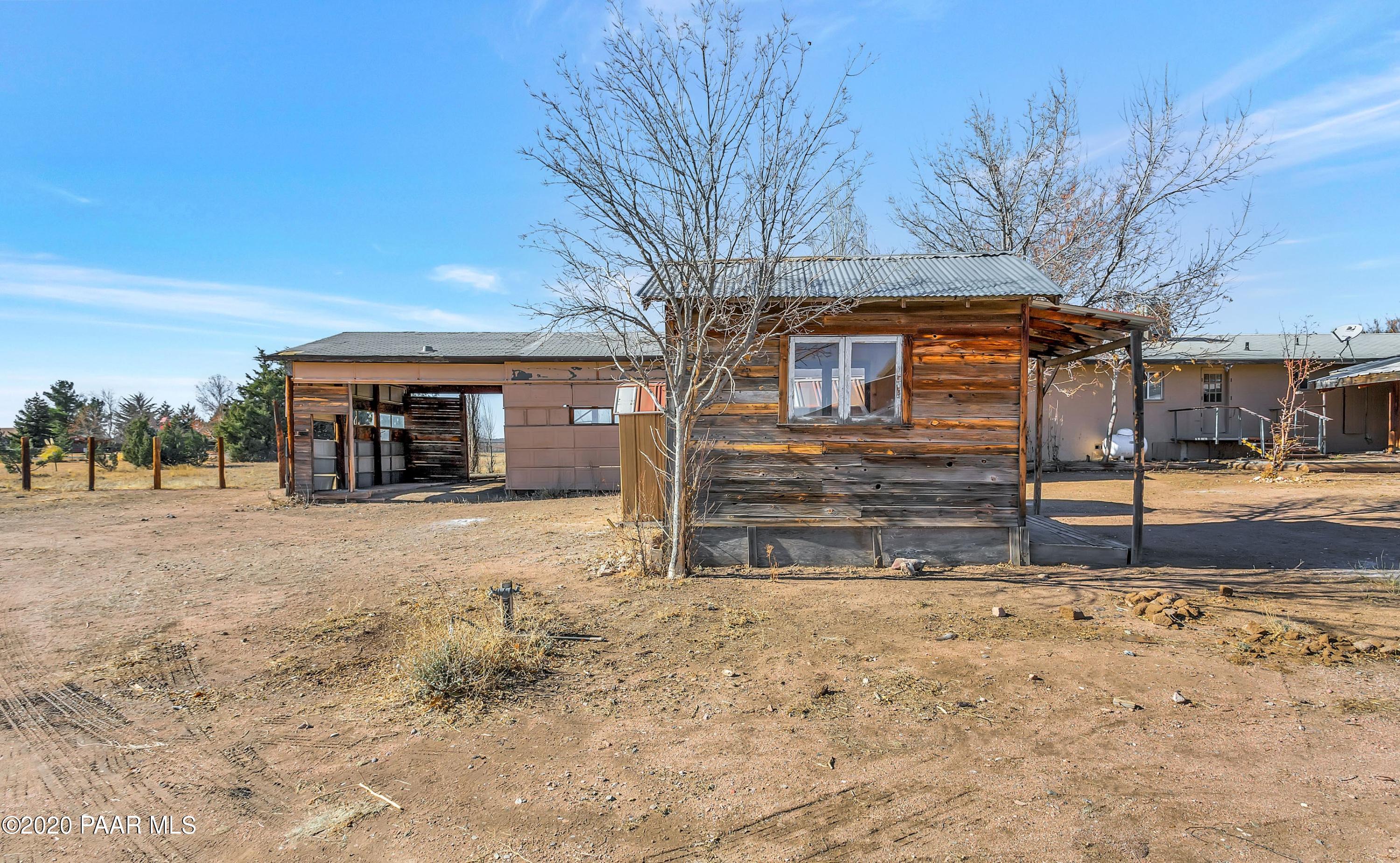 2571 North Reed Road Chino Valley, AZ 86323 - Photo 23 of 25 a view of house with a yard