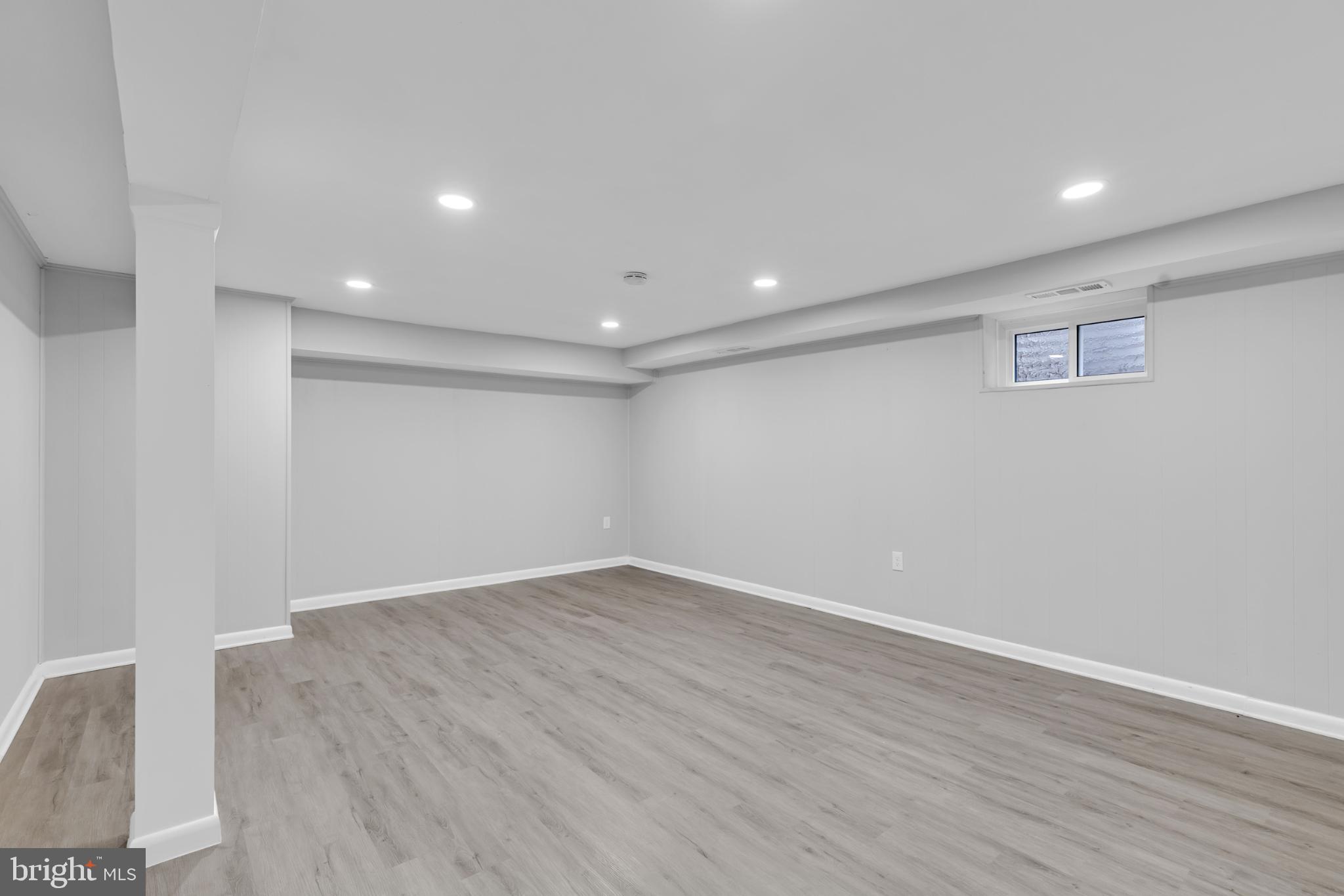 7403 Larne Lane Lorton, VA 22079 - Photo 23 of 31 a view of an empty room with wooden floor