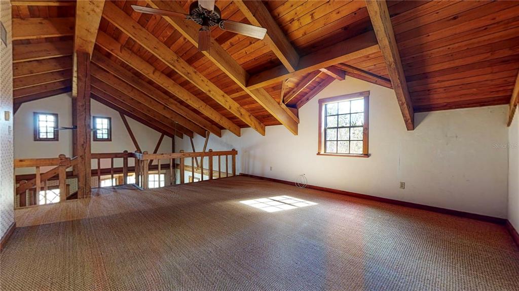 19803 Reading Road Lutz, FL 33558 - Photo 31 of 48 a view of an empty room with windows