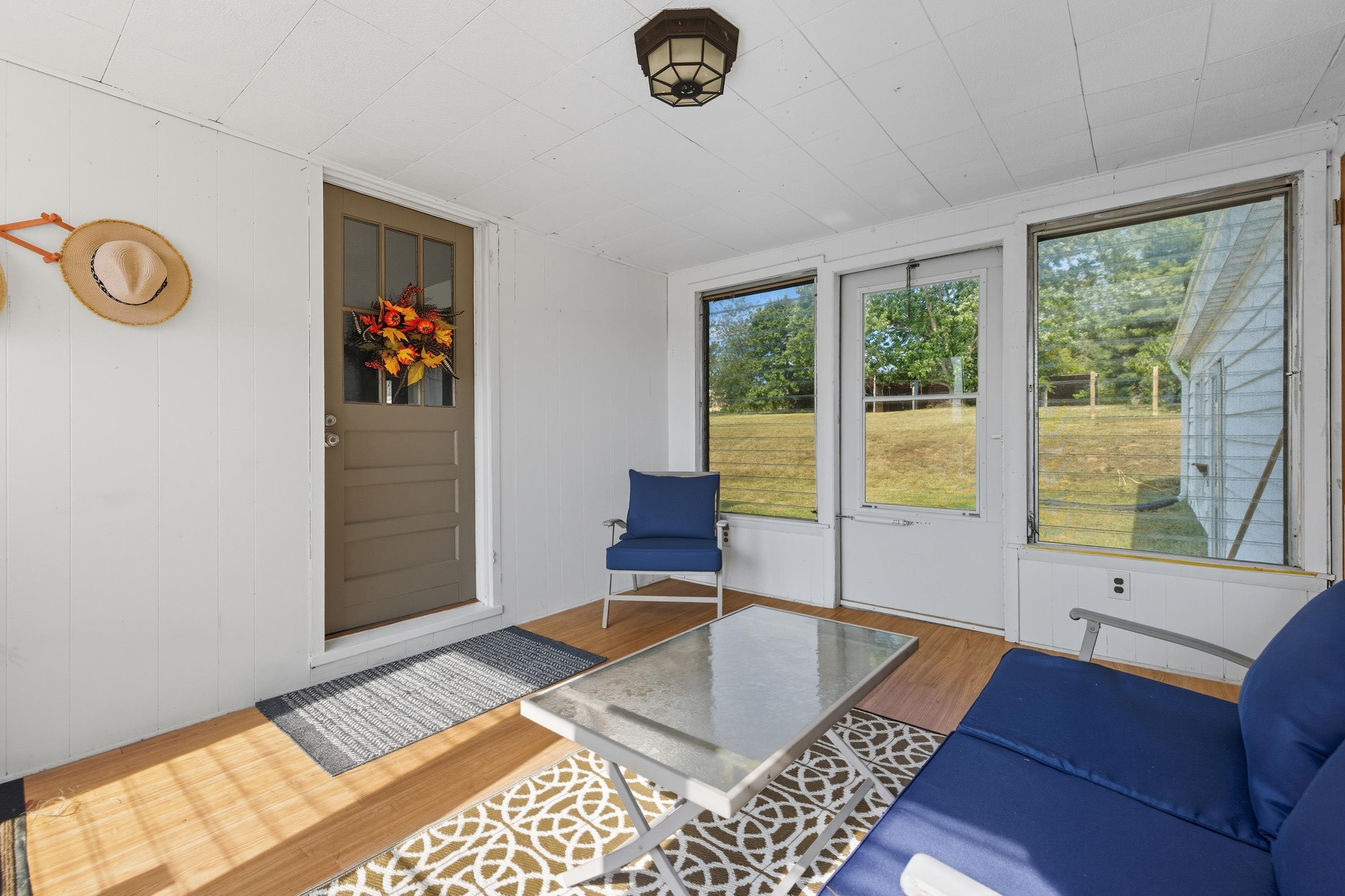 3138 Cross Keys Road Harrisonburg, VA 22801 - Photo 42 of 74 The porch area runs between the garage and main house. This room features lots of space for seating!