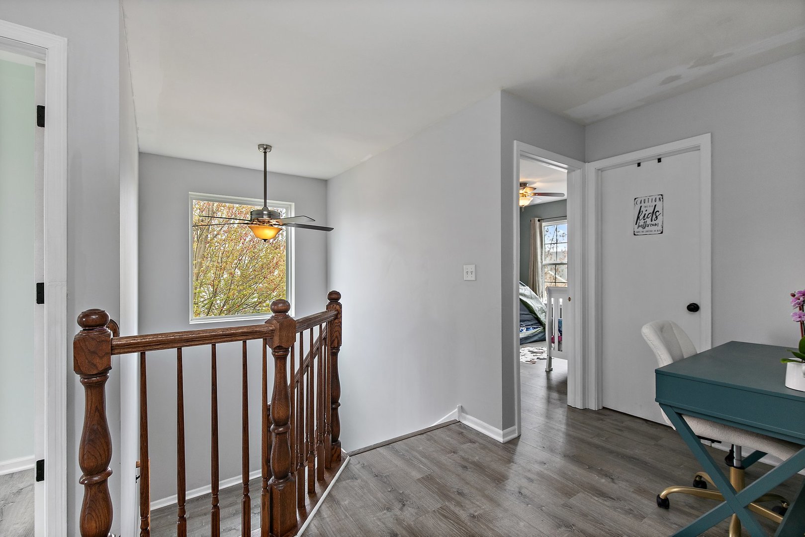 23 Boathouse Road Pingree Grove, IL 60140 - Photo 14 of 25 a view of a hallway with wooden floor and stairs