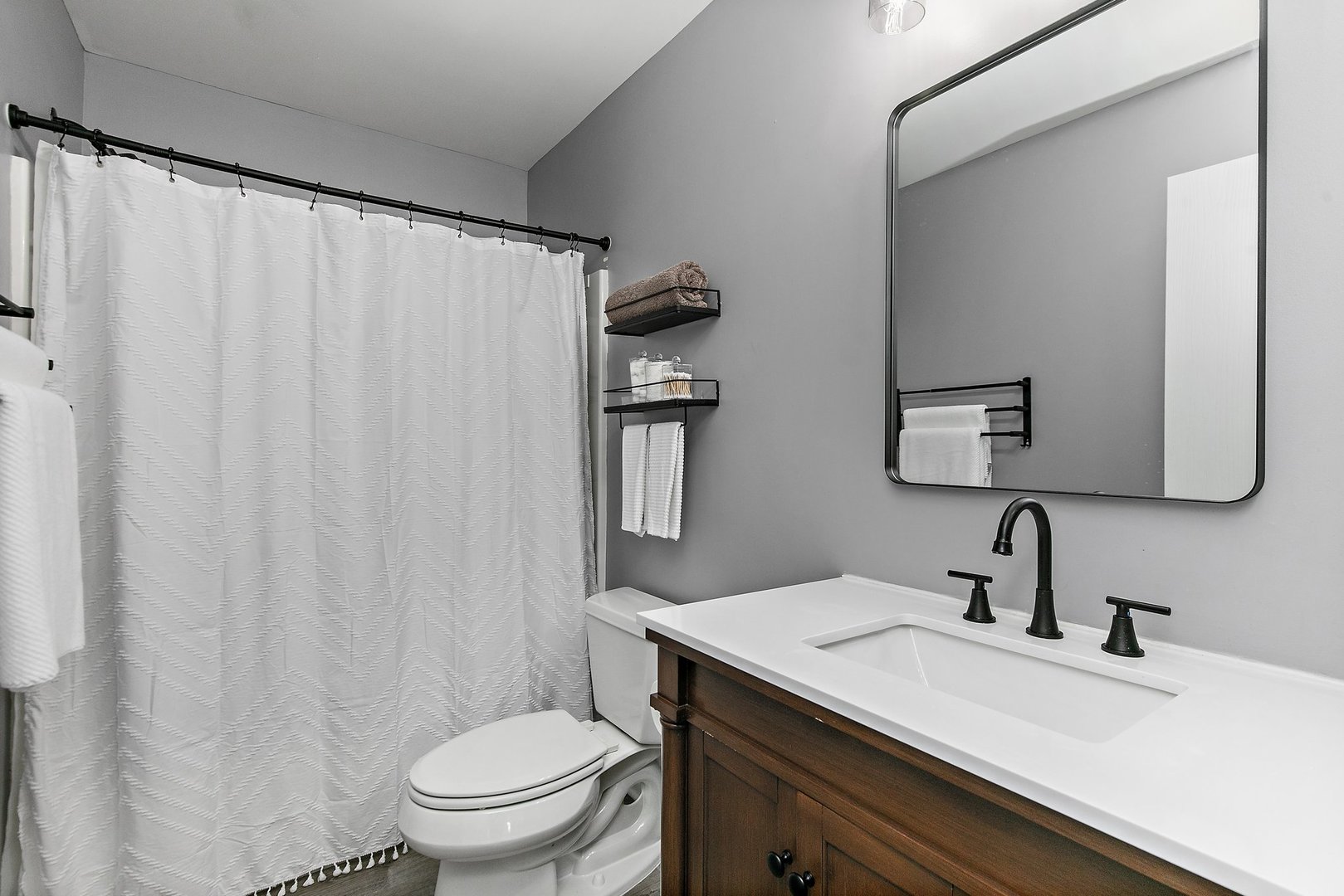 23 Boathouse Road Pingree Grove, IL 60140 - Photo 20 of 25 a bathroom with a sink a toilet and shower curtain