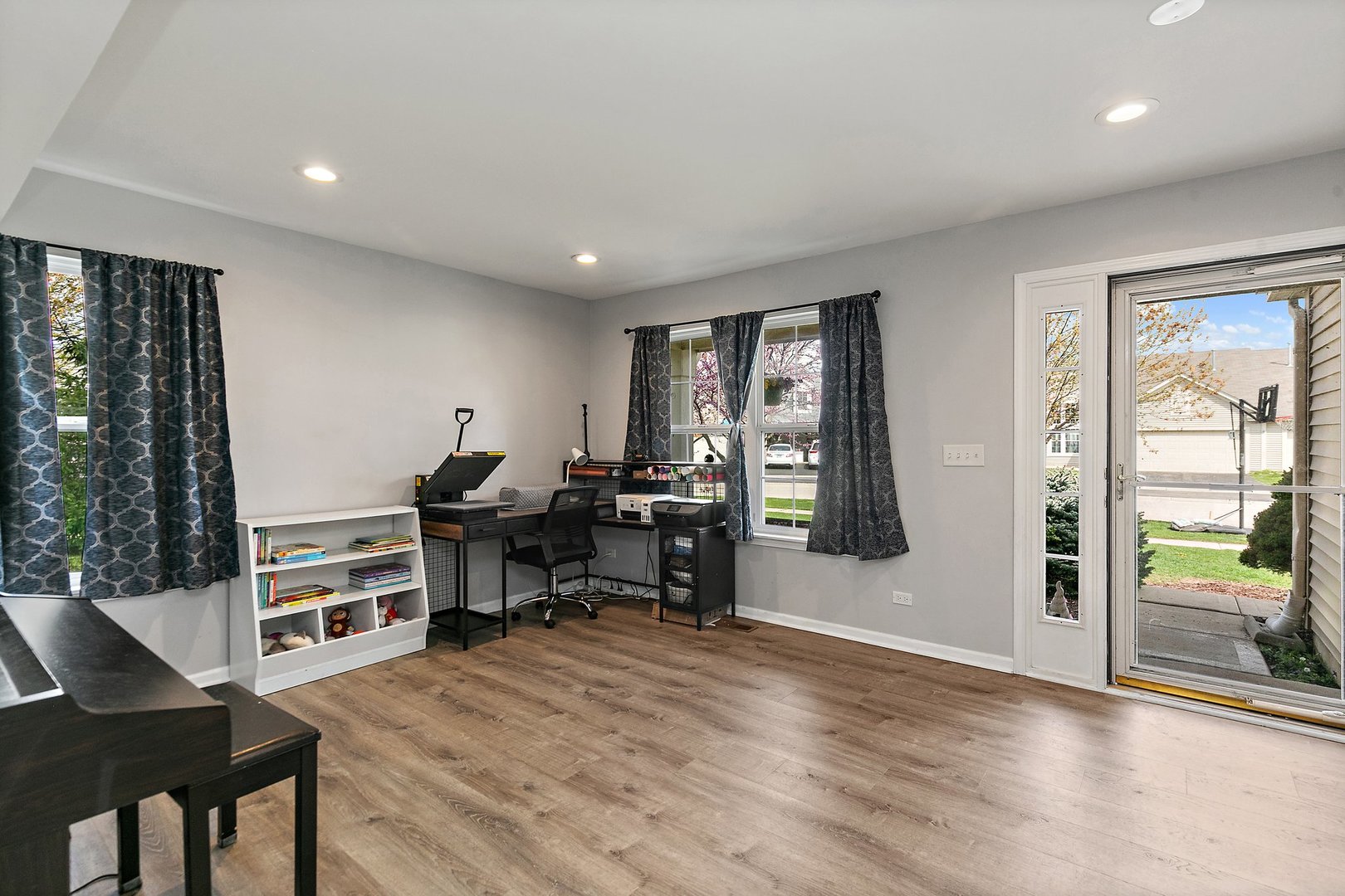 23 Boathouse Road Pingree Grove, IL 60140 - Photo 4 of 25 a view of a workspace with furniture and a window