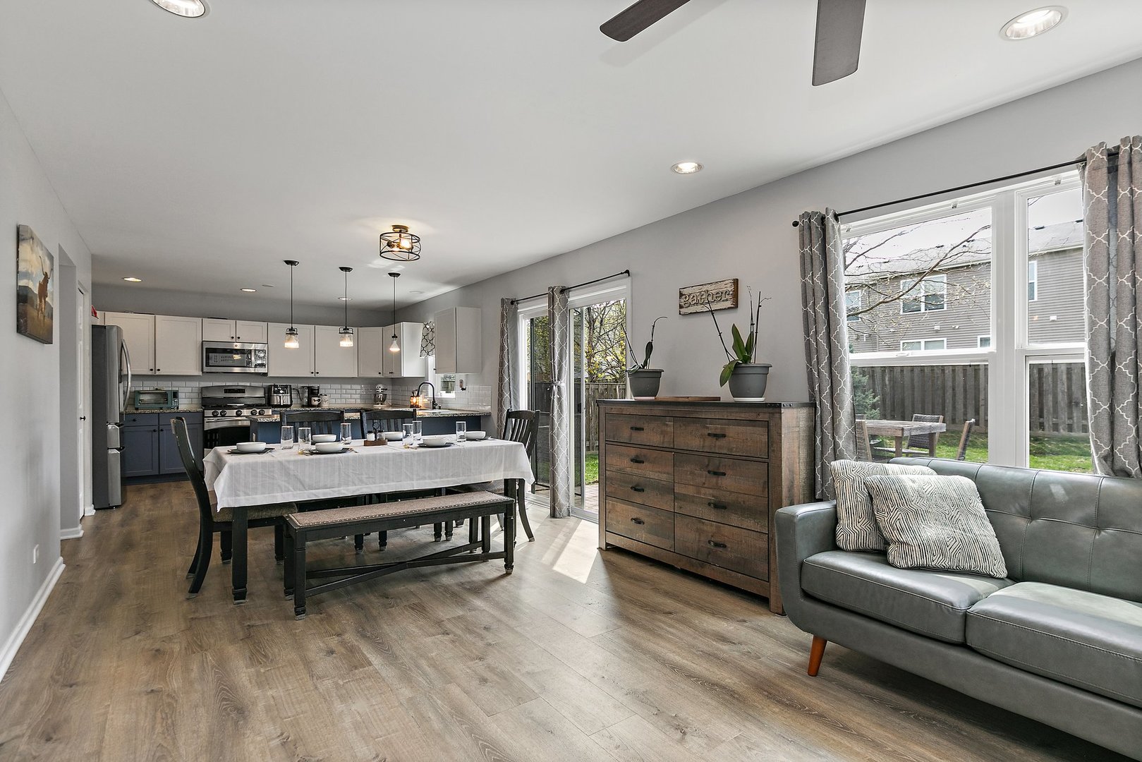 23 Boathouse Road Pingree Grove, IL 60140 - Photo 7 of 25 a living room with furniture and a large window