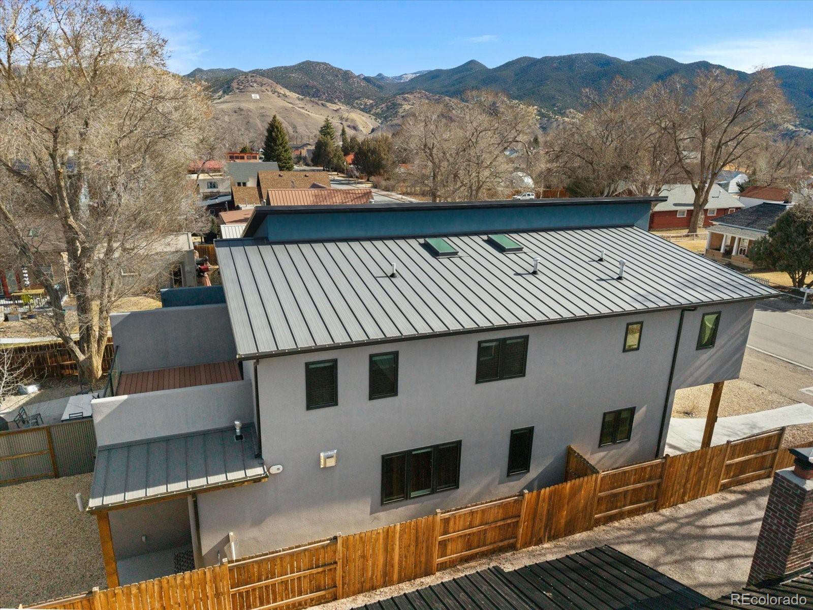 1036 H Street Salida, CO 81201 - Photo 14 of 50 a view of a house with a roof deck