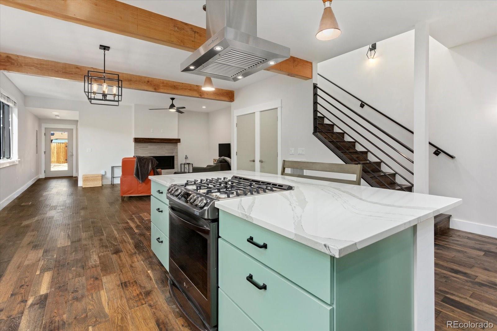 1036 H Street Salida, CO 81201 - Photo 21 of 50 a kitchen with a stove and a refrigerator