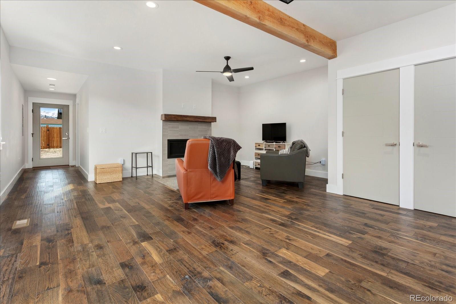 1036 H Street Salida, CO 81201 - Photo 26 of 50 a living room with furniture and a wooden floor