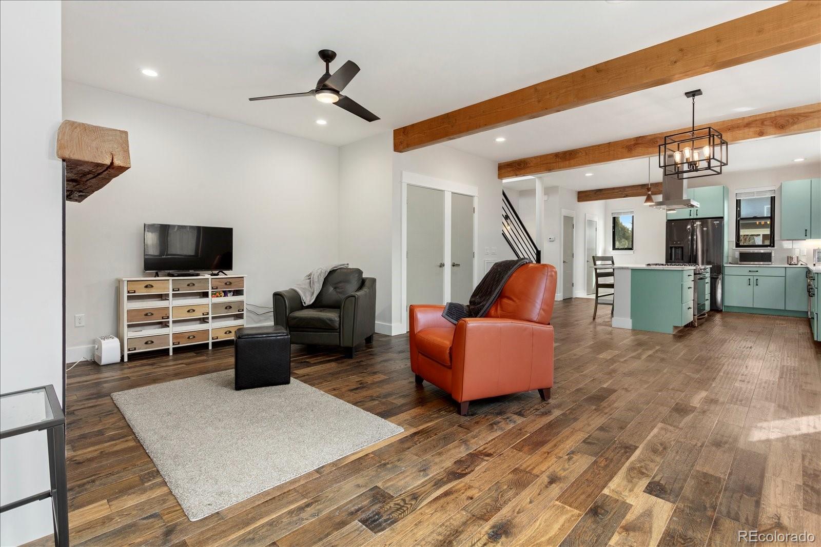 1036 H Street Salida, CO 81201 - Photo 27 of 50 a living room with furniture and a flat screen tv