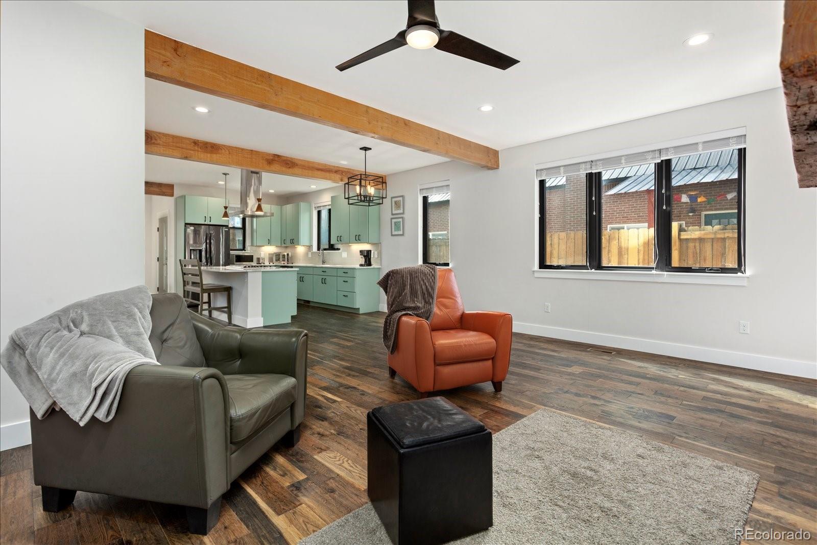 1036 H Street Salida, CO 81201 - Photo 28 of 50 a living room with furniture and a large window