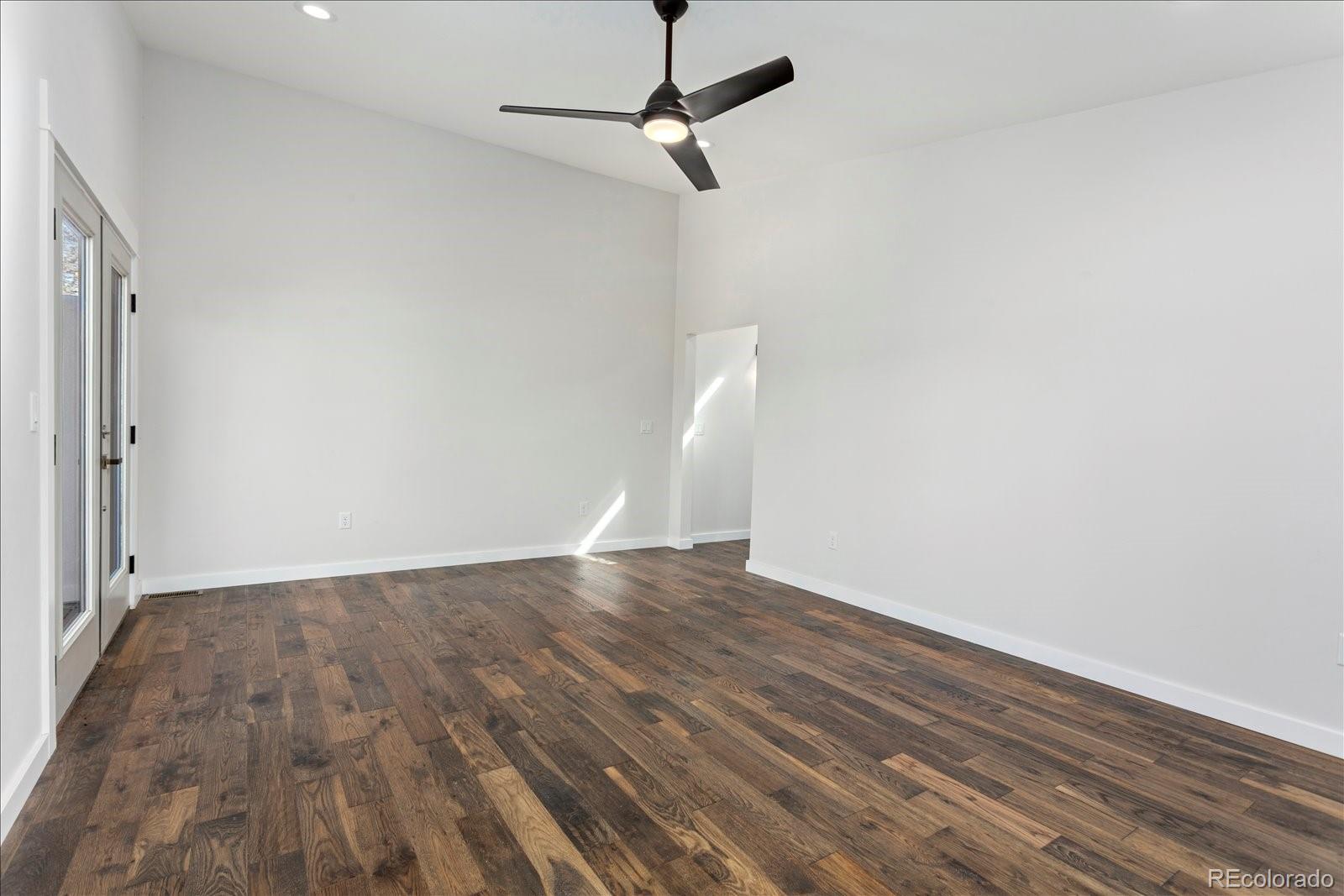 1036 H Street Salida, CO 81201 - Photo 41 of 50 a view of an empty room with wooden floor