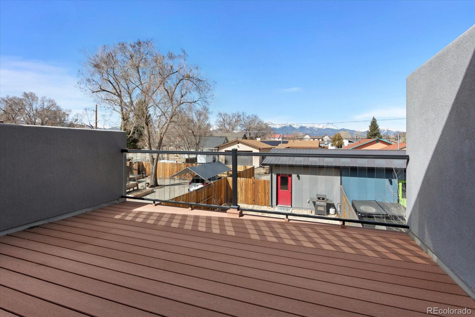 1036 H Street Salida, CO 81201 - Photo 10 of 50 a view of a terrace with wooden floor and seating space