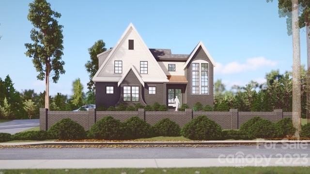 5515 Fairview Road Charlotte, NC 28209 - Photo 3 of 13 a view of a large house with a yard and plants