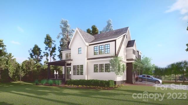 5515 Fairview Road Charlotte, NC 28209 - Photo 5 of 13 a front view of a house with a garden