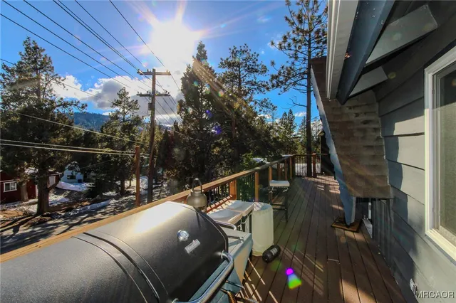a view of balcony with furniture