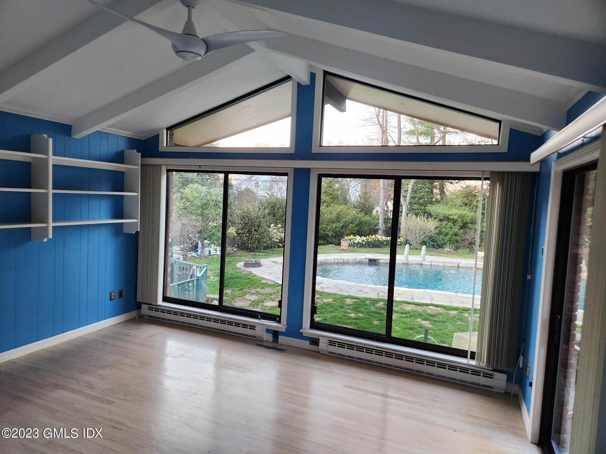 1 Seagate Road Riverside, CT 06878 - Photo 11 of 31 a view of room with window and floor to ceiling window