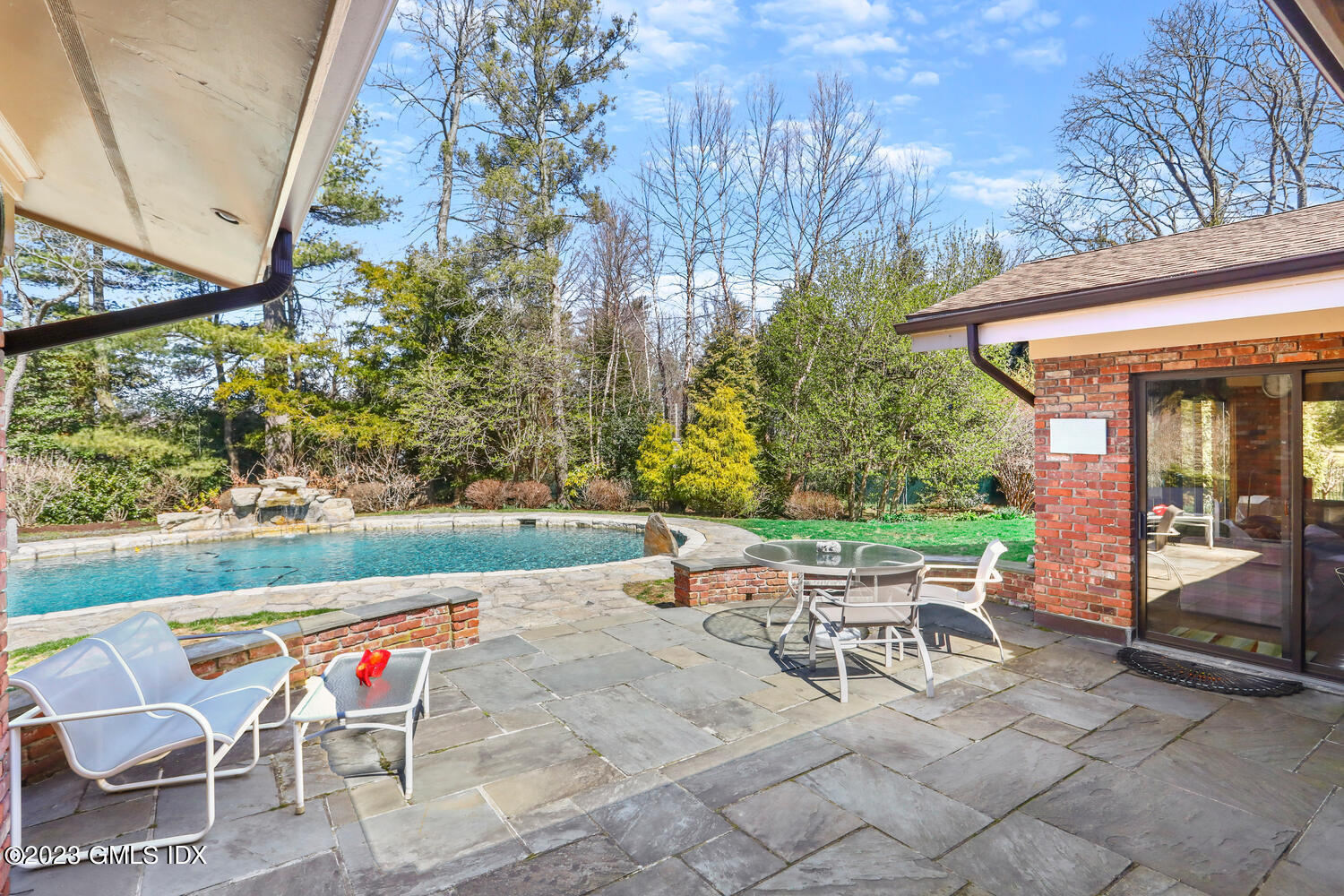 1 Seagate Road Riverside, CT 06878 - Photo 15 of 31 an outdoor sitting area with furniture and garden view