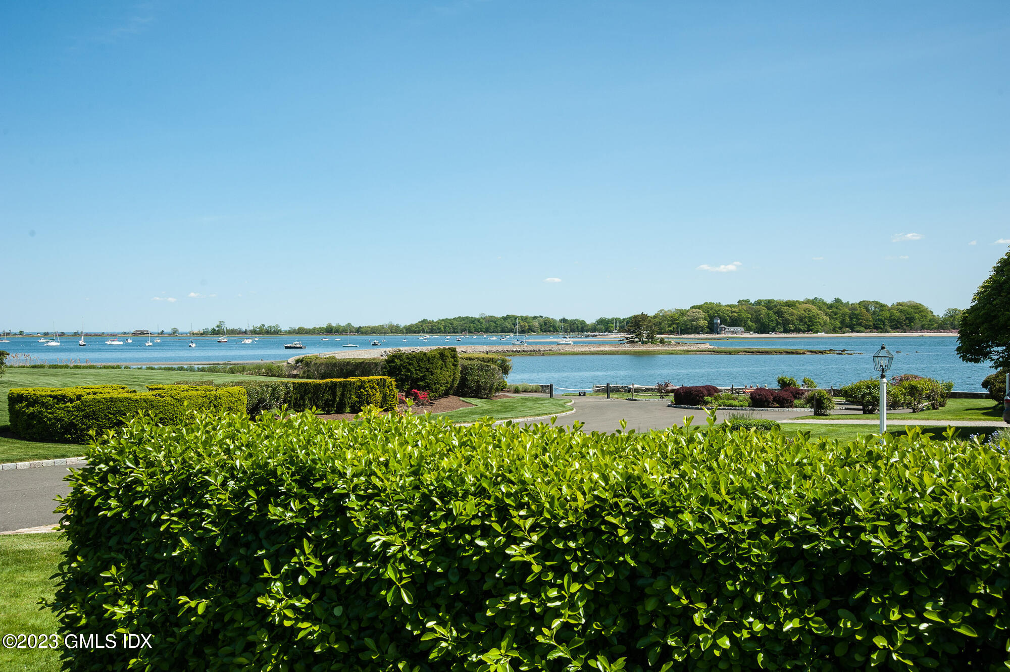 1 Seagate Road Riverside, CT 06878 - Photo 18 of 31 a view of a lake with houses in the back