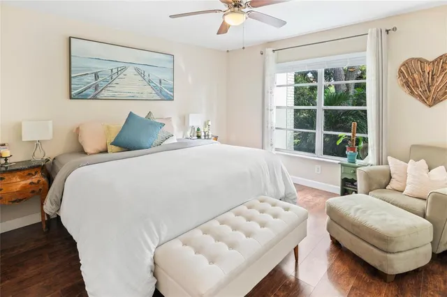 a bedroom with a bed and a couch