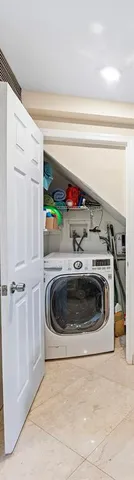 a utility room with washer and dryer