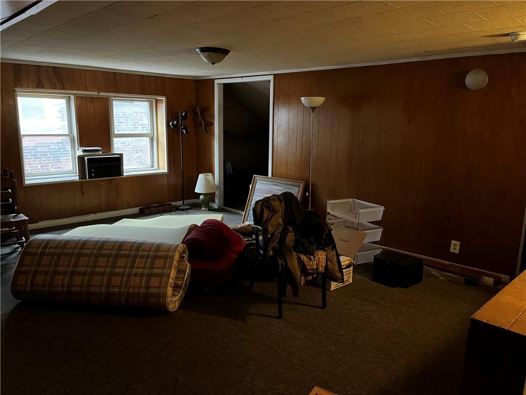 334 Main Street Pittsburgh, PA 15201 - Photo 21 of 24 a bedroom with a bed and a window