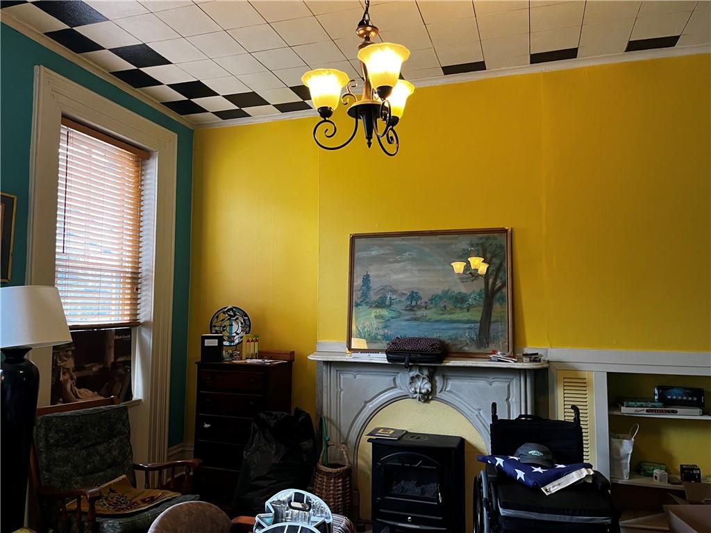 334 Main Street Pittsburgh, PA 15201 - Photo 3 of 24 a living room with fireplace furniture and a window