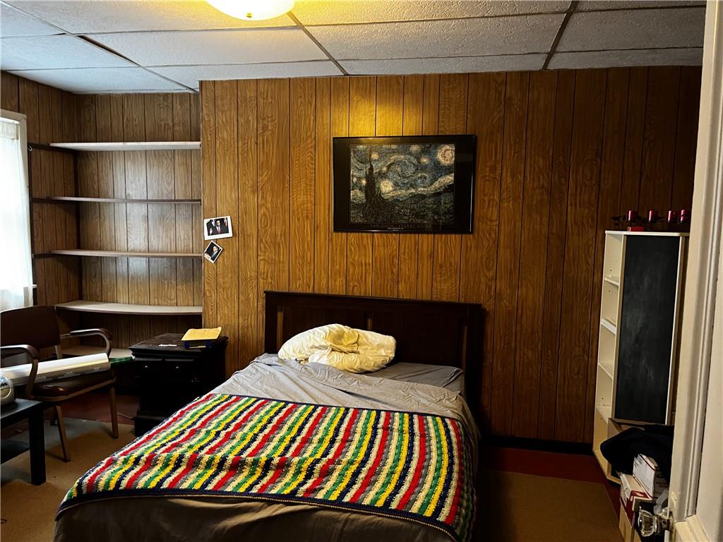 334 Main Street Pittsburgh, PA 15201 - Photo 6 of 24 a bedroom with a bed and furniture