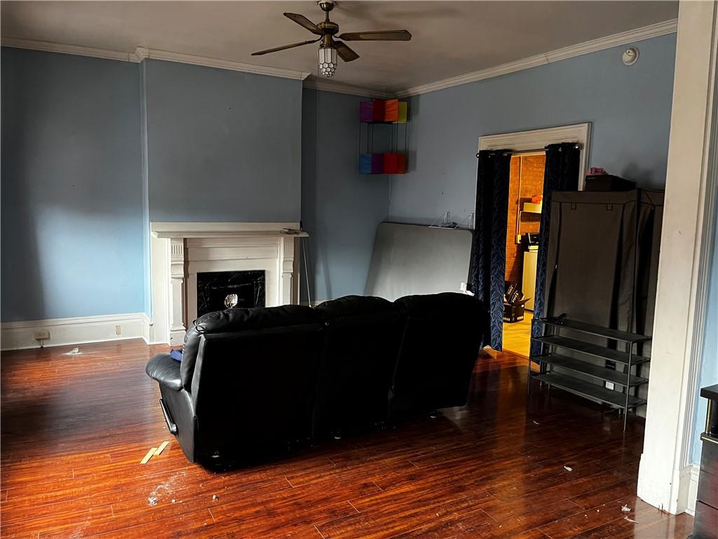 334 Main Street Pittsburgh, PA 15201 - Photo 7 of 24 a living room with furniture and a fireplace