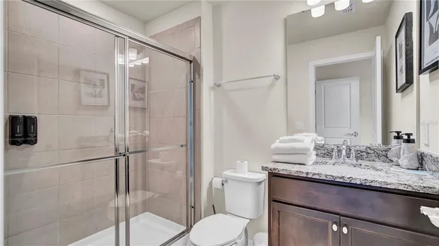 a en suite bathroom with a sink and vanity