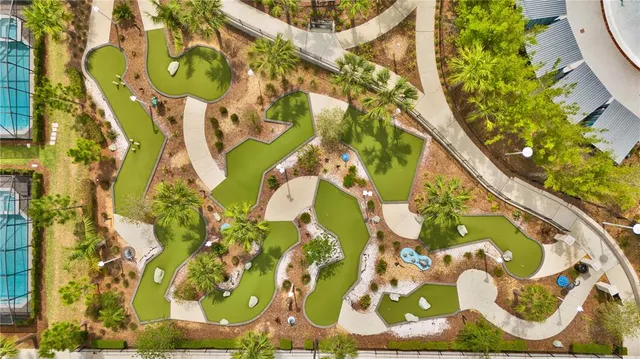 a view of a swimming pool with an ocean view