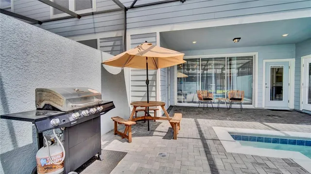 a view of a hall with sitting area