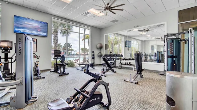 a view of a play room with toys and wooden floor