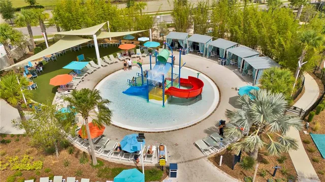 a bedroom with a bed and dresser