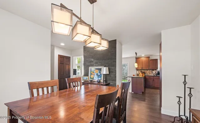 a view of a dining room with furniture window and outside view