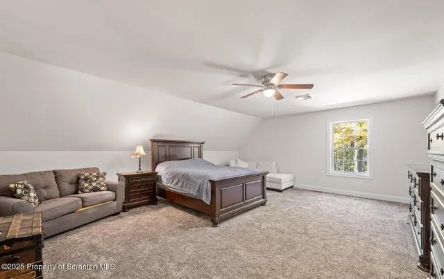 a view of workspace with wooden floor windows
