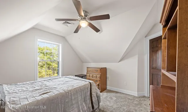 a bathroom with a sink toilet and a mirror