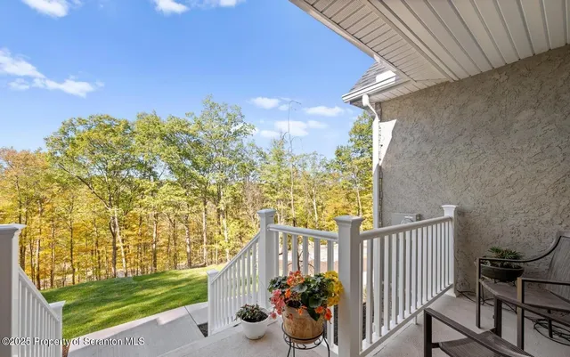 a view of a porch with a garden