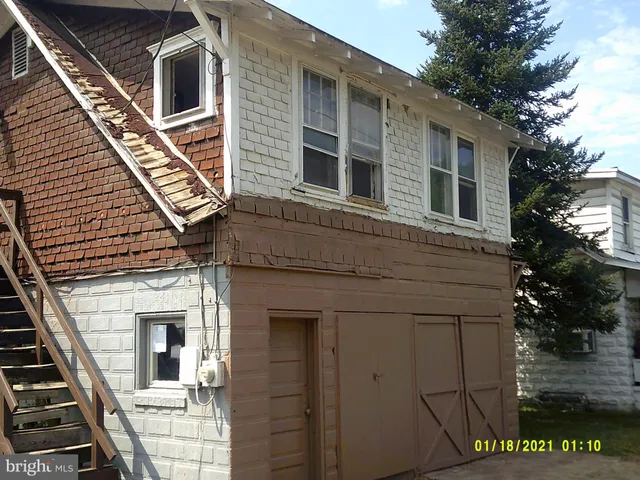 a front view of a house with balcony