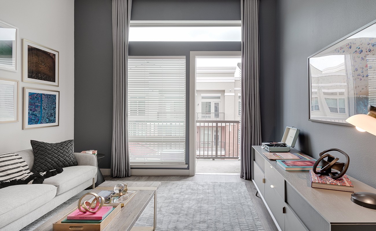 a living room with furniture and a window