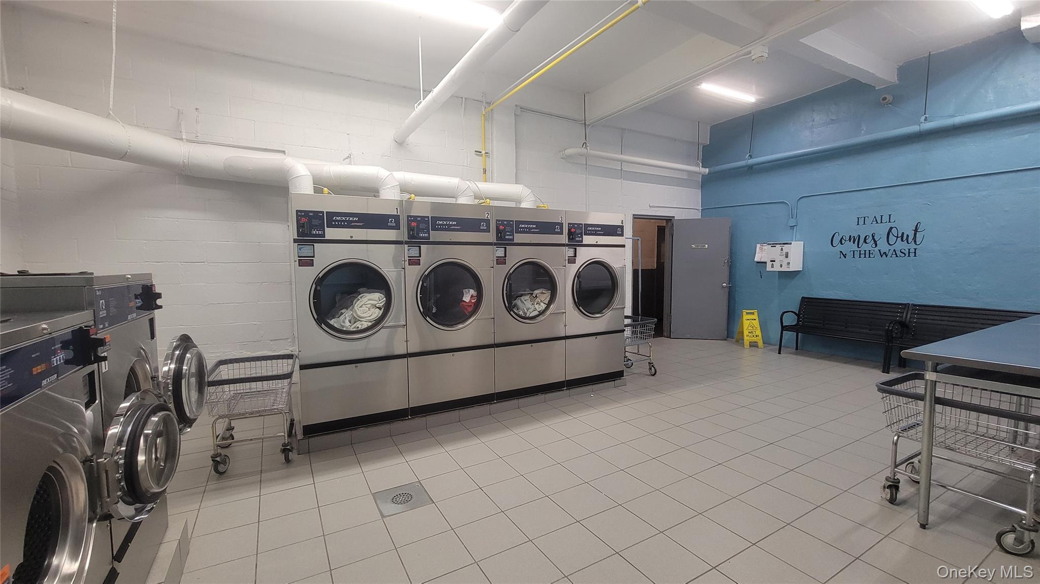 99-30 59th Avenue, Unit 5A Queens, NY 11368 - Photo 8 of 15 a utility room with dryer and washer