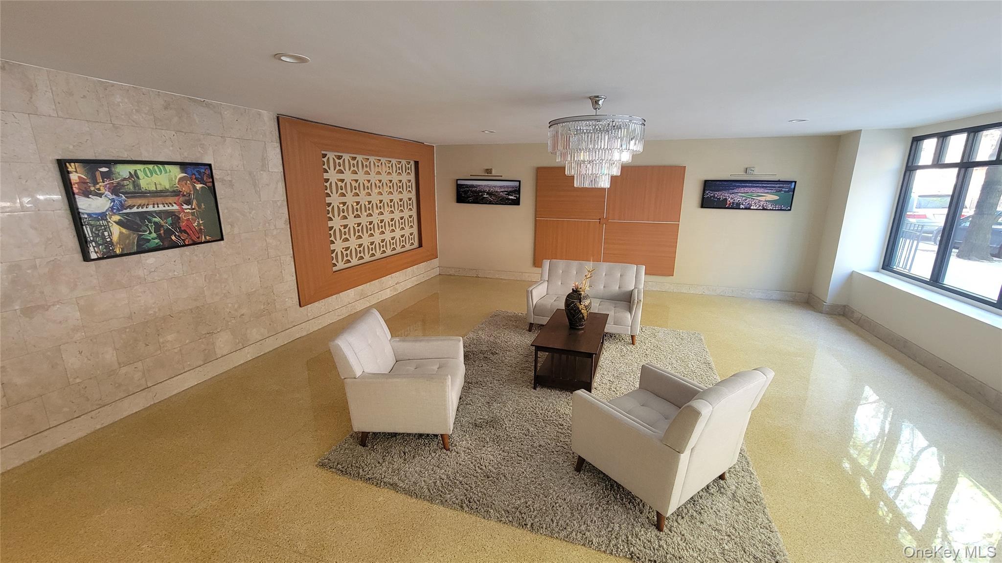 99-30 59th Avenue, Unit 5A Queens, NY 11368 - Photo 10 of 15 a living room with furniture and window