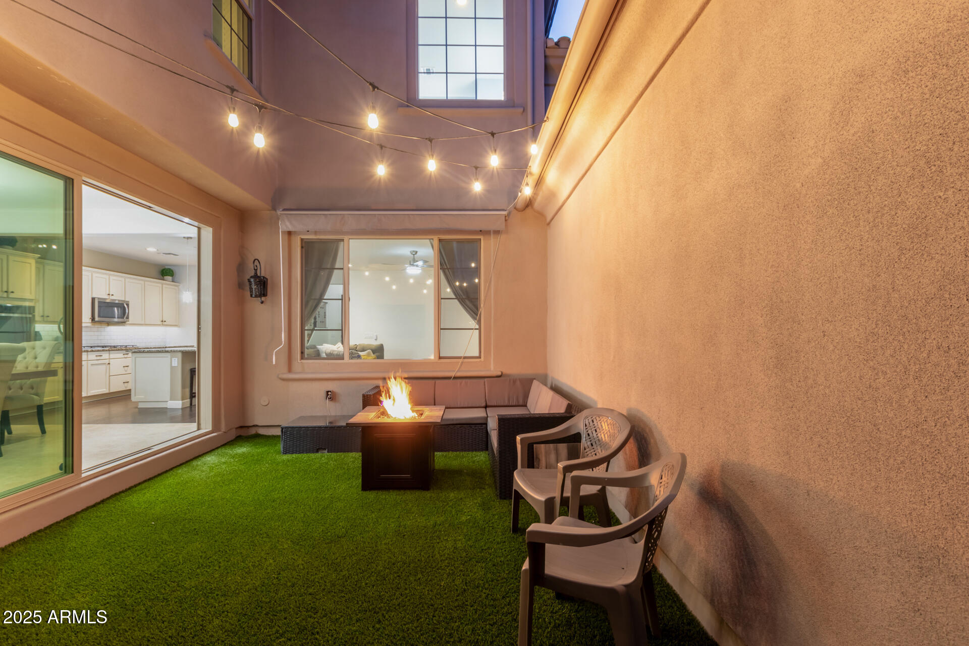 18557 North 94th Street Scottsdale, AZ 85255 - Photo 11 of 27 a room with furniture and a window