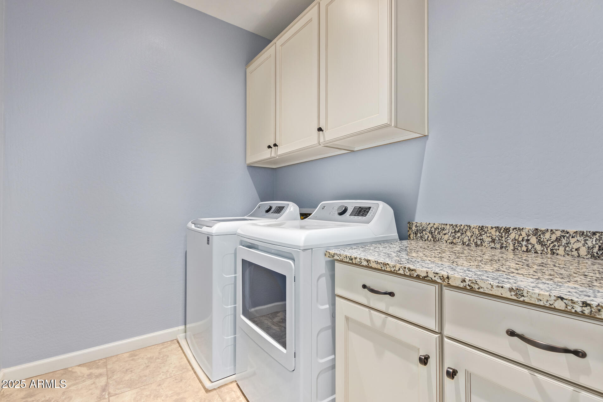 18557 North 94th Street Scottsdale, AZ 85255 - Photo 23 of 27 a utility room with dryer and washer