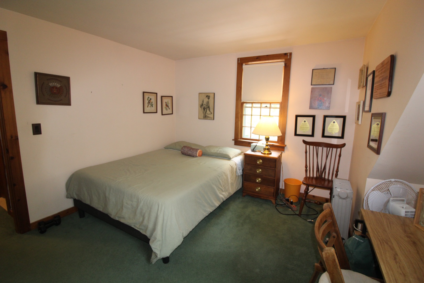 19 Vickers Street Edgartown, MA 02539 - Photo 10 of 16 a bed sitting in a bedroom next to a window