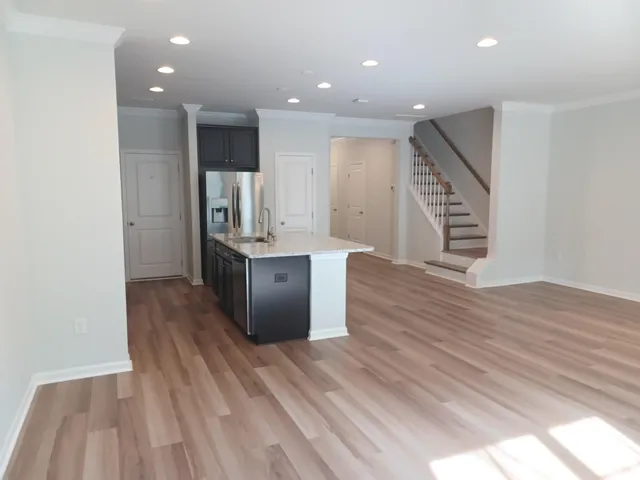 a view of kitchen with cabinets