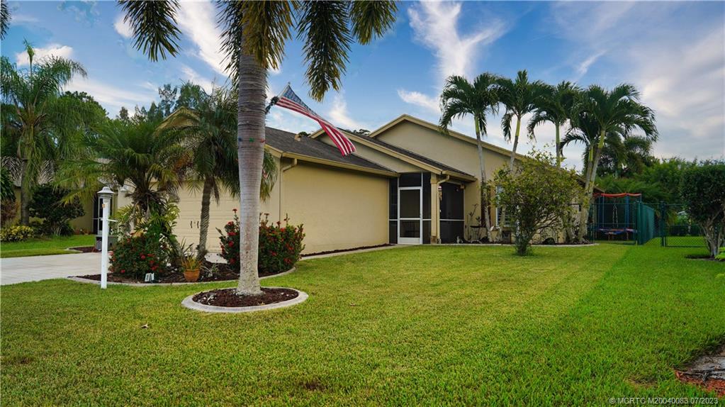 a view of a backyard with a house