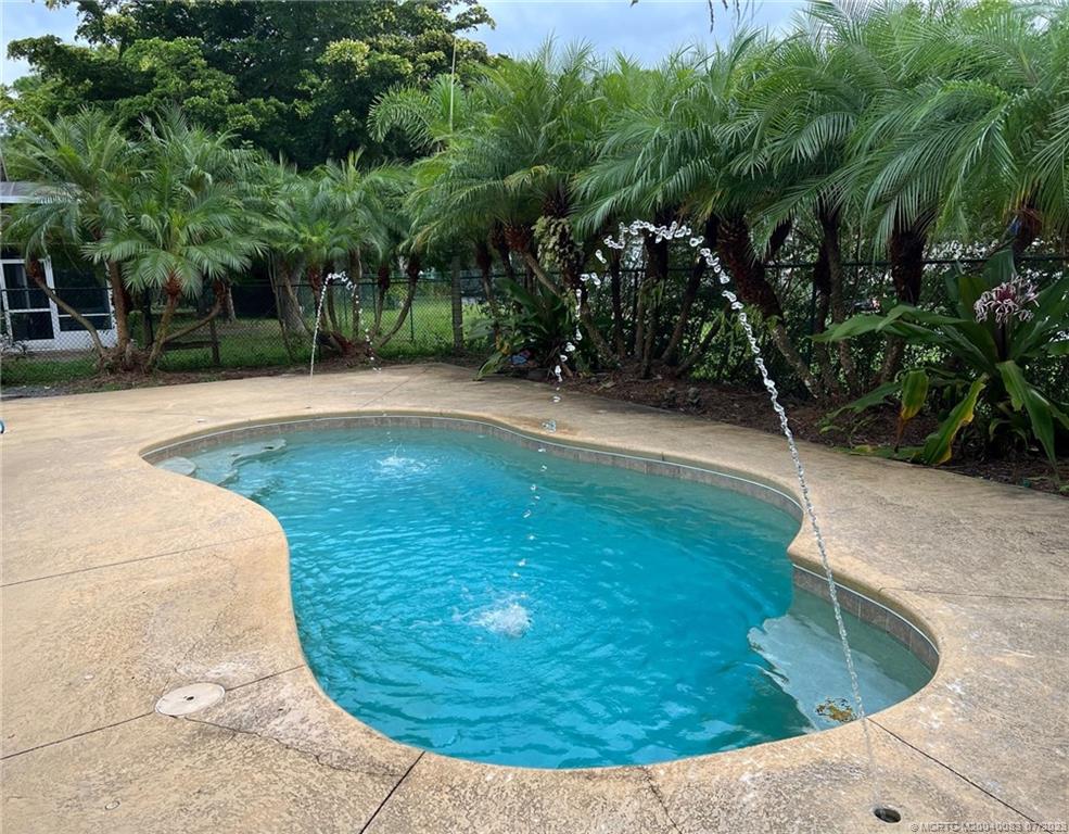 2440 Southwest Riviera Road Stuart, FL 34997 - Photo 15 of 18 a view of a backyard