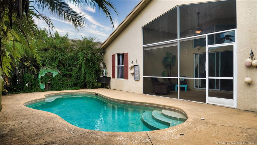 2440 Southwest Riviera Road Stuart, FL 34997 - Photo 16 of 18 a view of outdoor space with swimming pool