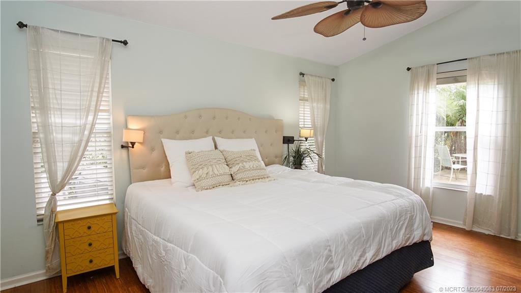 2440 Southwest Riviera Road Stuart, FL 34997 - Photo 7 of 18 a bedroom with a bed and a window